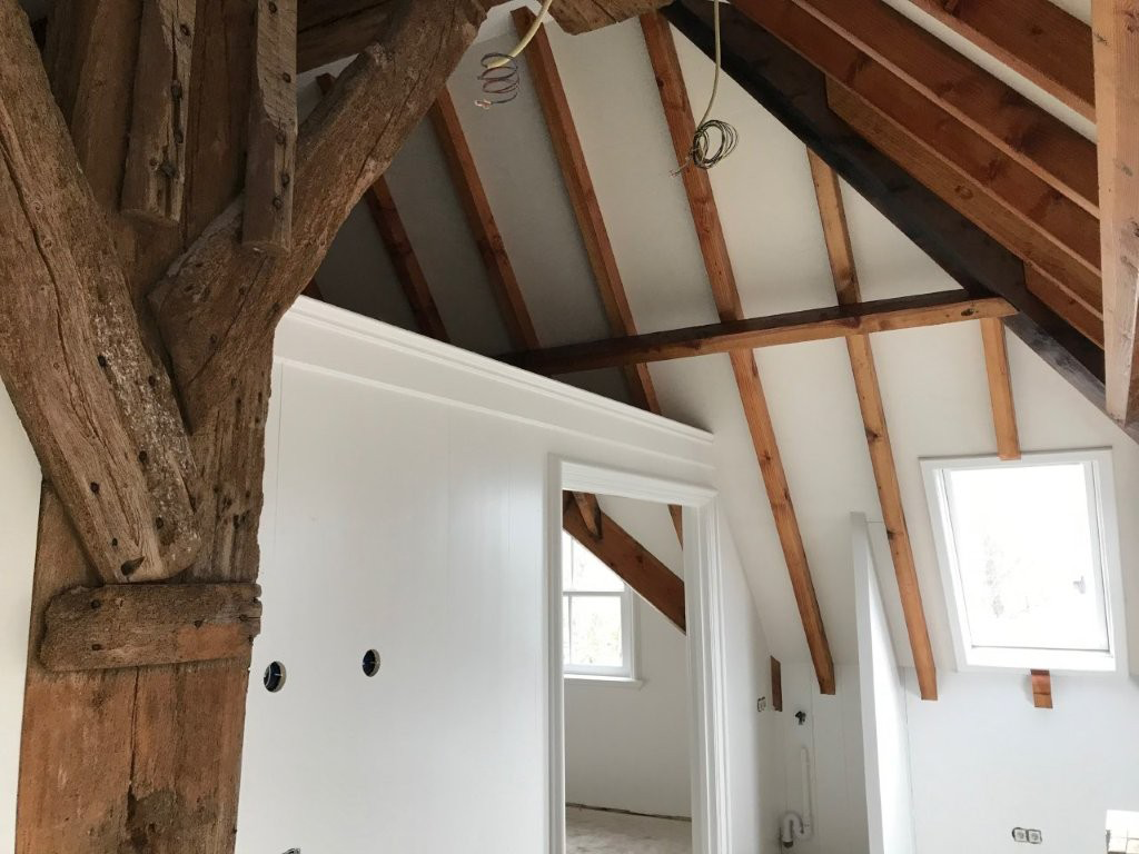 Stuc met houten balken